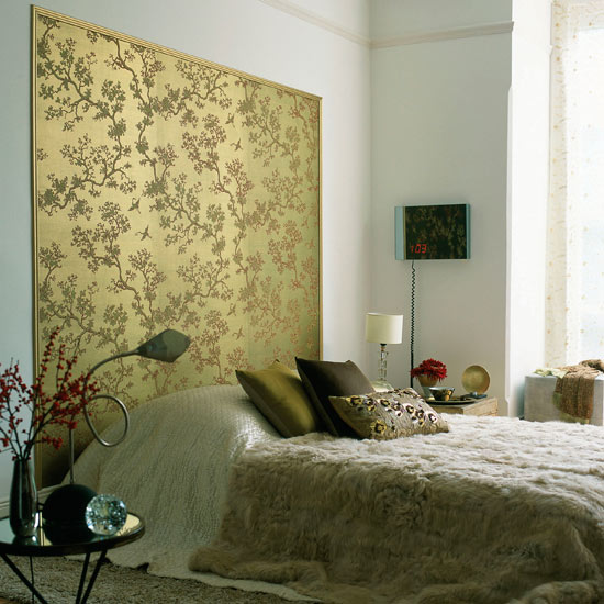 Luxury-bedroom-with-platform-bed-with-golden-tree-wallpaper-for-decoration- 